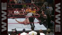 Big Show Chokeslams Undertaker Through The Ring