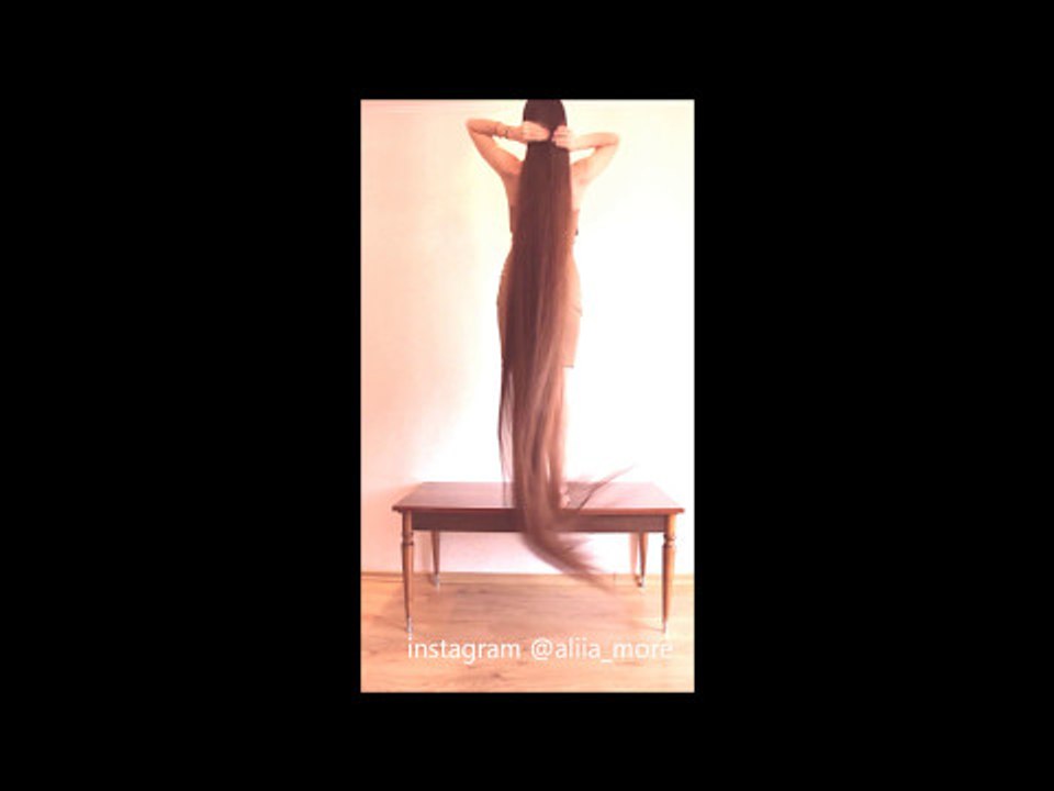 Woman Demonstrates Ridiculously Long Hair