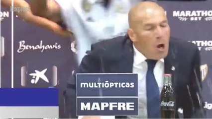 Douche de champagne pour Zizou après le titre du Réal Madrid