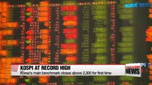 Korean stocks close at record high of 2,304