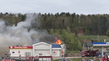 Firefighter Trapped as Facade of Burning Building Collapses in Michigan