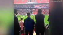 Millwall fans invade the pitch at Wembley to celebrate promotion