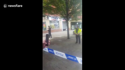 Visitors evacuated by armed police out of Manchester's Arndale shopping center