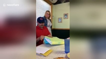 Woman surprises stepfather with adoption papers