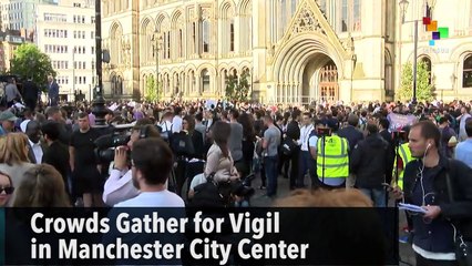 Crowds Gather for Vigil in Manchester City Center