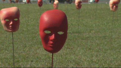 Brazilians display red masks in symbolic anti-corruption protest