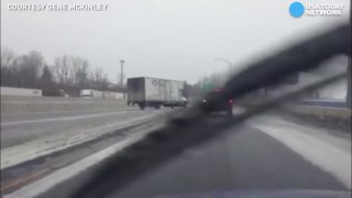 Truck slips and slides on icy road, causing crash-A4Fq5DFT_Ww