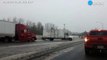 Truck slips and slides on icy road, causing crash-A4Fq5DFT_Ww