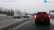 Truck slips and slides on icy road, causing cr