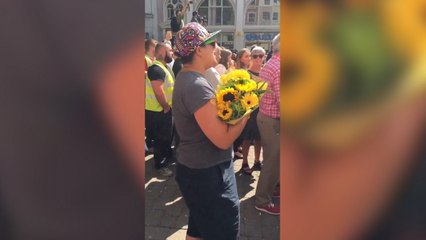 Minute's silence in Manchester ends with emotional rendition of Don't Look Back in Anger