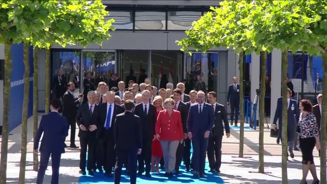 Macron appears to swerve away from Trump at NATO summit