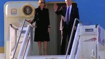 Hand Melania leave President Trump grabbing air as they disembark Air Force One in Rome