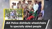 Jammu and Kashmir Police distribute wheelchairs to specially abled people