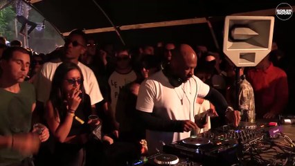 Guy hanging from pole @ Dekmantel - Boiler Room Moments