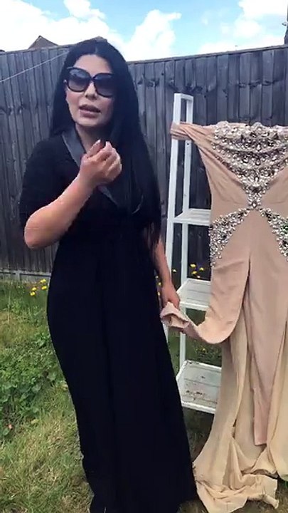 Afghan singer burns dress in viral video after uproar at home