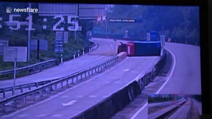 Hundreds of chicks spill onto motorway as transport lorry tips over