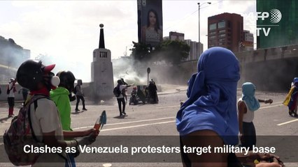 Clashes as Venezuela protesters target military base