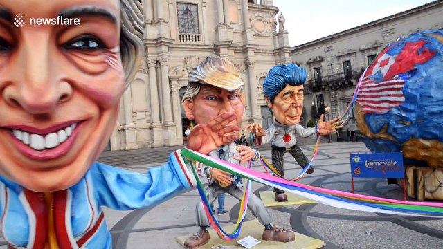 Theresa May and fellow G7 leaders captured in papier-maché