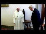 Trump in a video purporting to grab the hand of the Pope who pushed his hand as did Melania
