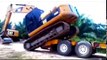 equipment loading fails, loading and unloading heavy equipment, loading trucks with excava