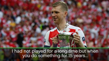 Returning Mertesacker just happy to help Arsenal
