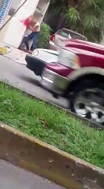 ZOMBIE WOMAN CAUGHT IN BROAD DAYLIGHT SMASHING HEAD INTO WALL