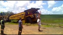 construction equipment stuck in mud, excavator gets stuck excavator fail, tractor mudding