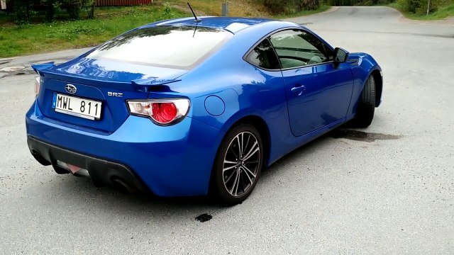 Girl driving Subaru BRZ, with Milltek exhaust