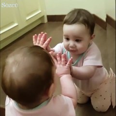 Bu aynadaki tatlı bebek kim?