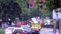 Ambulance & Fire engines responding with siren and lights in B