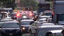 Ambulance responding with air horn, priority siren, peace sign & FDNY EMS assista
