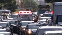 Ambulance responding with air horn, priority siren, peace sign & FDNY EMS as