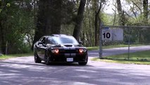 Challenger SRT 392 vs 520 hp of Mustang Roush 5XR-drag race 1 4