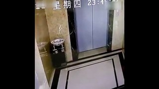 RAW  Drunk man falls into elevator shaft after kicking doors o