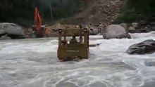 Dozer attempts river crossi