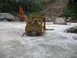 Dozer attempts river cros