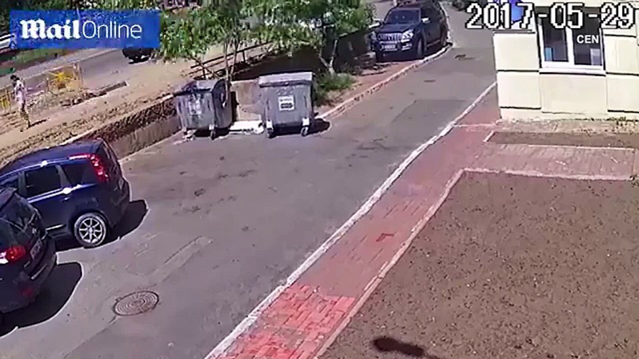 Moment underground water pipe explodes through the soil and leaves a GIANT six 64ft crater in the ground