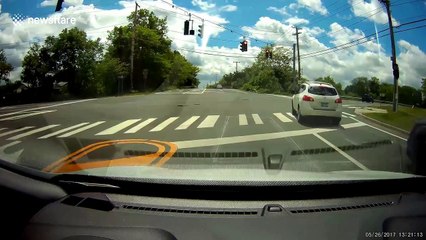 Driver runs red light and gets hit by oncoming vehicle