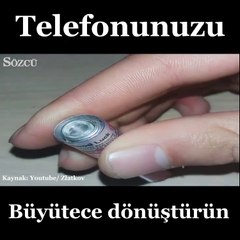 Telefonunu büyütece dönüştürdü!