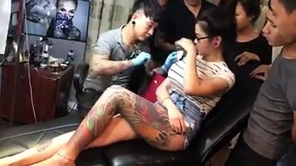 Asian girl boo pops getting a tattoo Hd