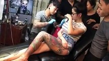 Asian girl boo pops getting a tattoo Hd