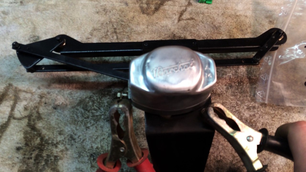 essai d'un moteur d'essuie-glace refait avec sa tringlerie