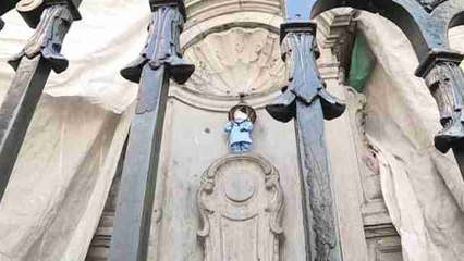 El Manneken Pis se disfraza para luchar contra el hambre en África