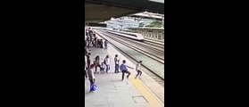 Heart-stopping - Suicidal woman saved at last second from approaching train in China