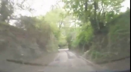 Woman Chases Down Runaway Car