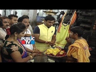 Amulyas's marriage: Groom Jagadish and family performing pooja at Temple