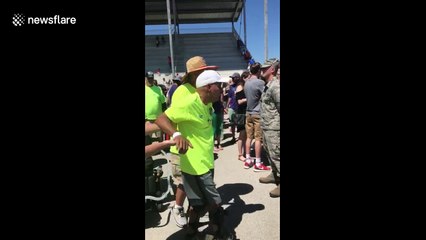 Veteran with ALS walks from wheelchair to greet graduate son