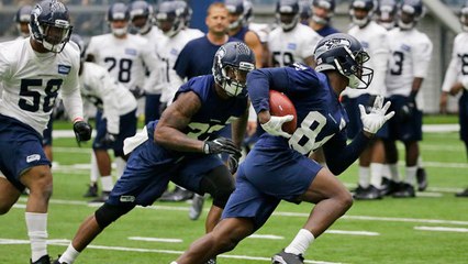 Wyche: Despite 'tension,' on field 'Hawks are 'all business'