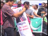 Congress workers protest over Indo-Pak match, burn Nawaz Sharif effigy - Tv9