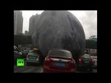 Pedestrians, drivers shocked at ‘furious moon’ rolling along across Chinese streets